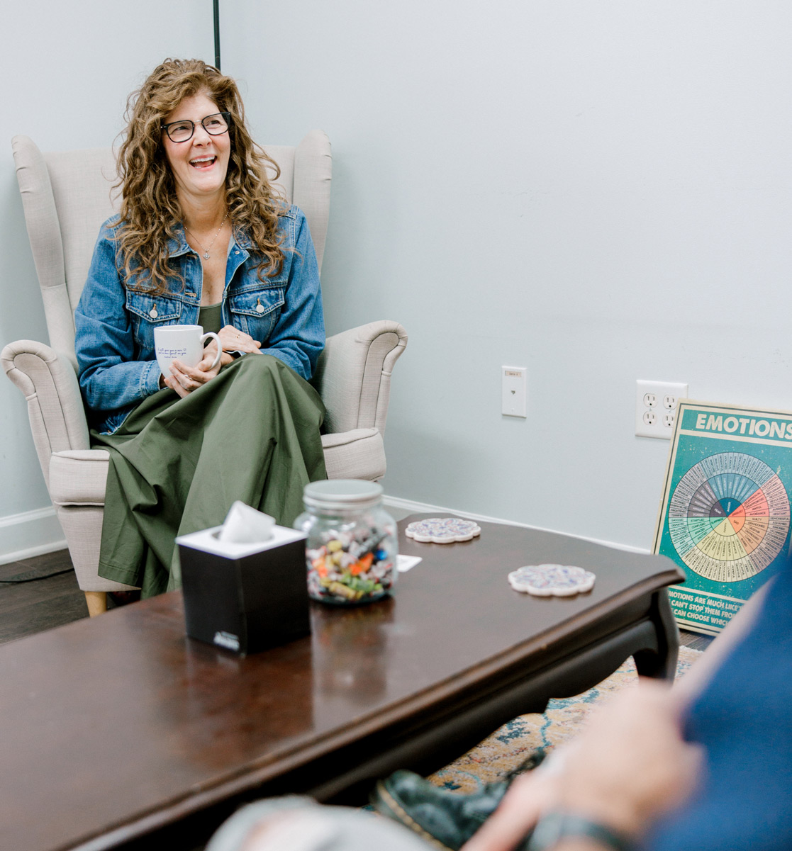 Therapist speaking with a client